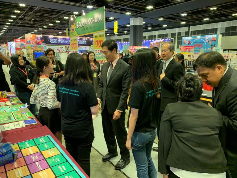 Our staff introducing the educational coding toys Kamibot and Cubico to Education Minister Ong Ye Kung. 